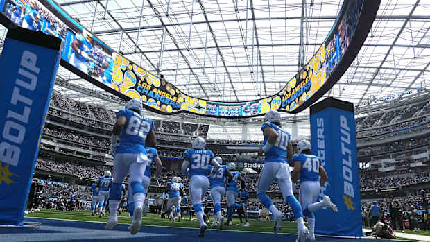 Sep 25, 2022; Inglewood, California, USA; A general overall view as Los Angeles Chargers tight end Richard Rodgers (82), quarterback Justin Herbert (10), fullback Zander Horvath (40) and running back Austin Ekeler (30) head onto the field before the game against the Jacksonville Jaguars SoFi Stadium. Mandatory Credit: Kirby Lee-USA TODAY Sports